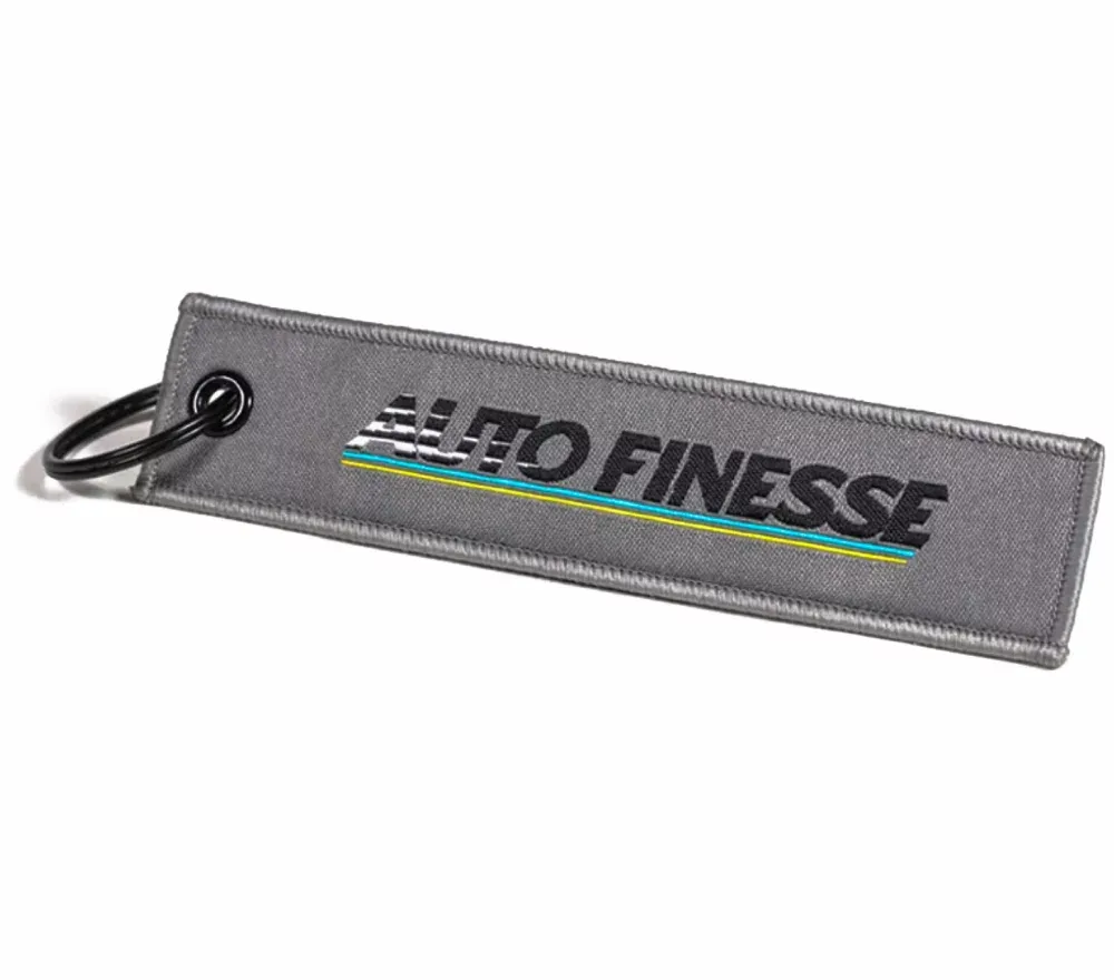 Přívěsek na klíče Auto Finesse Retro Race Tag - šedý